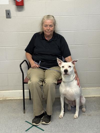 Staff person from Dothan Animal Shelter with a dog